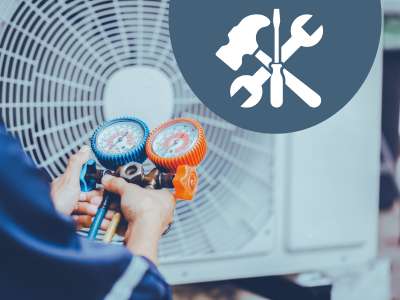 Technician performing HVAC Maintenance